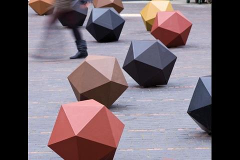 The 20-sided bollards are meant to resemble trinkets spilled over a carpet